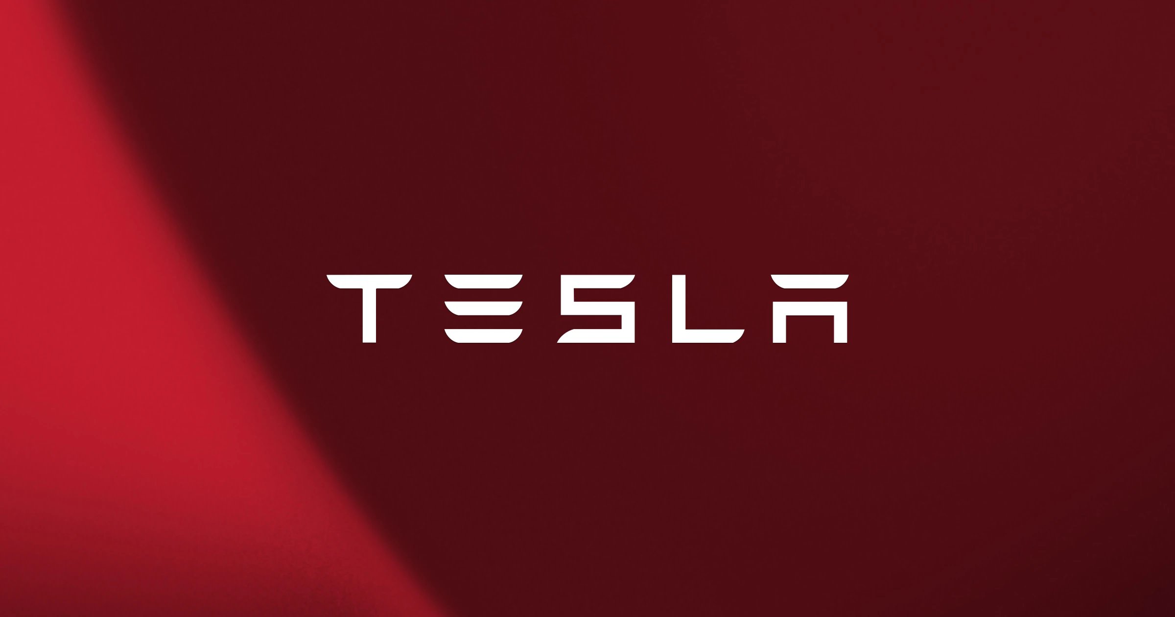 Tesla logo on a red gradient